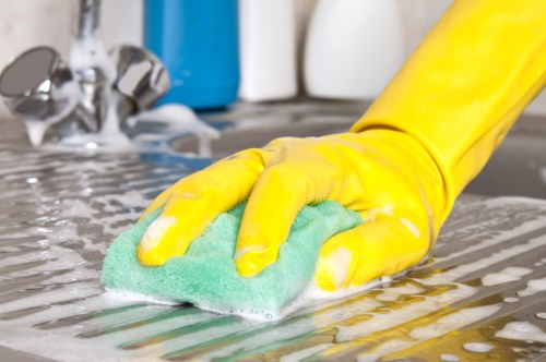 Technician performing deep sofa cleaning