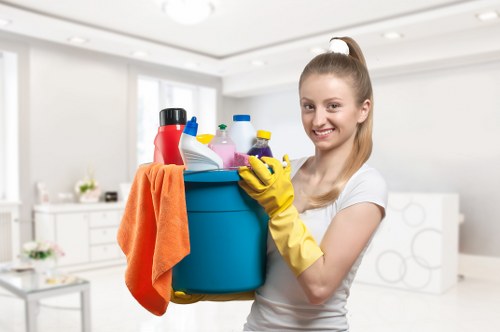 Cleaner wearing PPE while working on a carpet cleaning task
