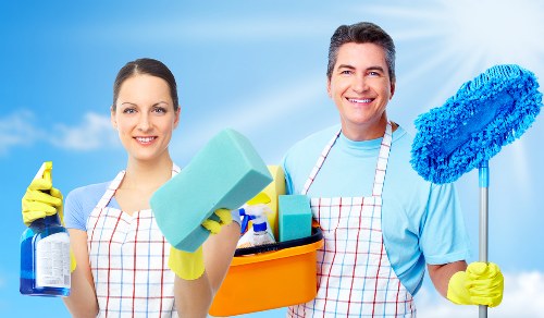 Cleaner responding to a workplace hazard during carpet cleaning